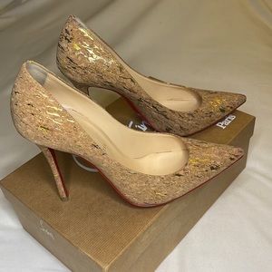 Christian Louboutin
Decoltish Metallic Cork Red Sole Pump, great condition  39